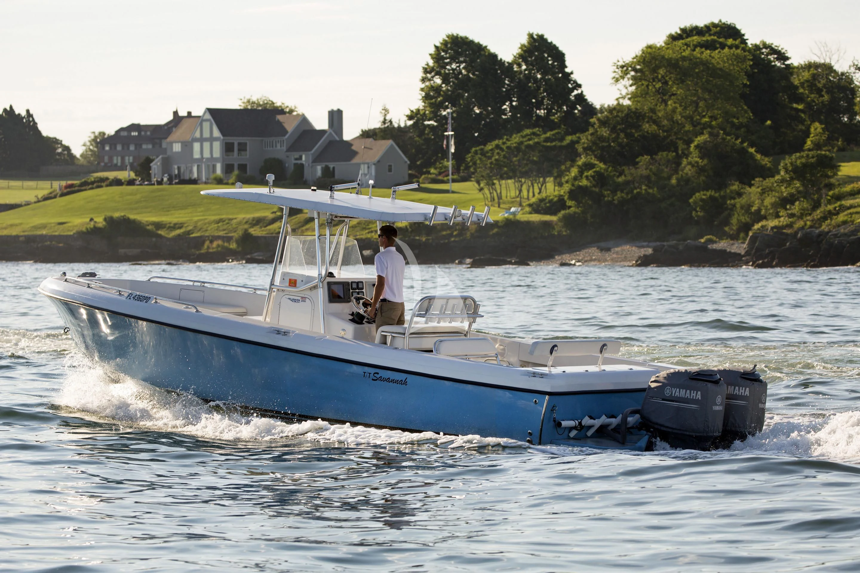 a boat with a motor attached to it aboard XOXO Yacht for Charter