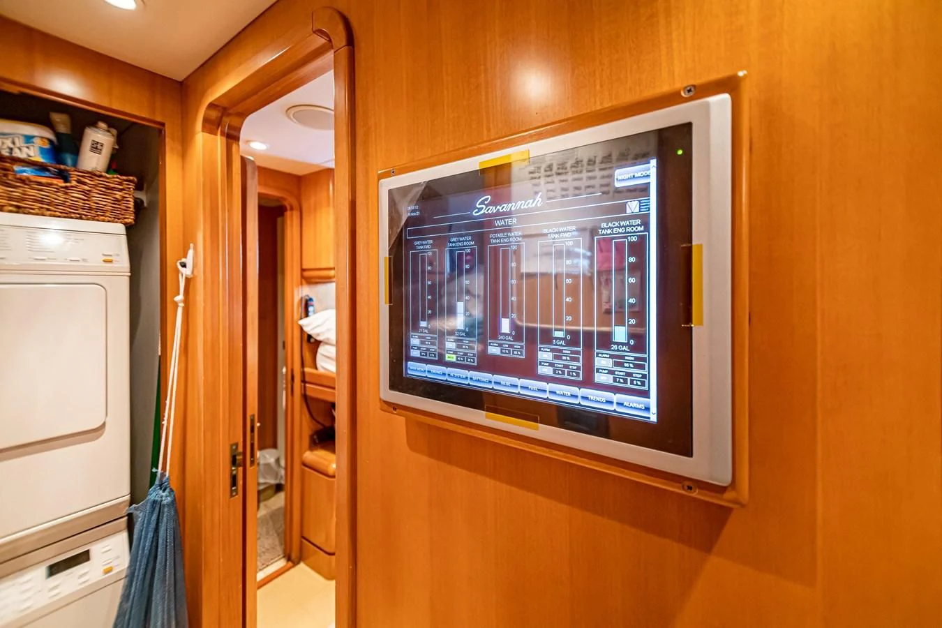 a tv on a wall aboard XOXO Yacht for Charter