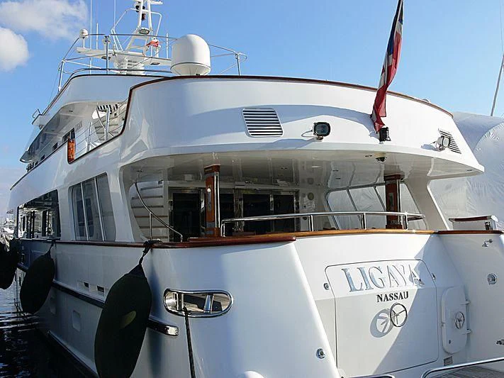a white and black boat aboard LIGAYA Yacht for Sale