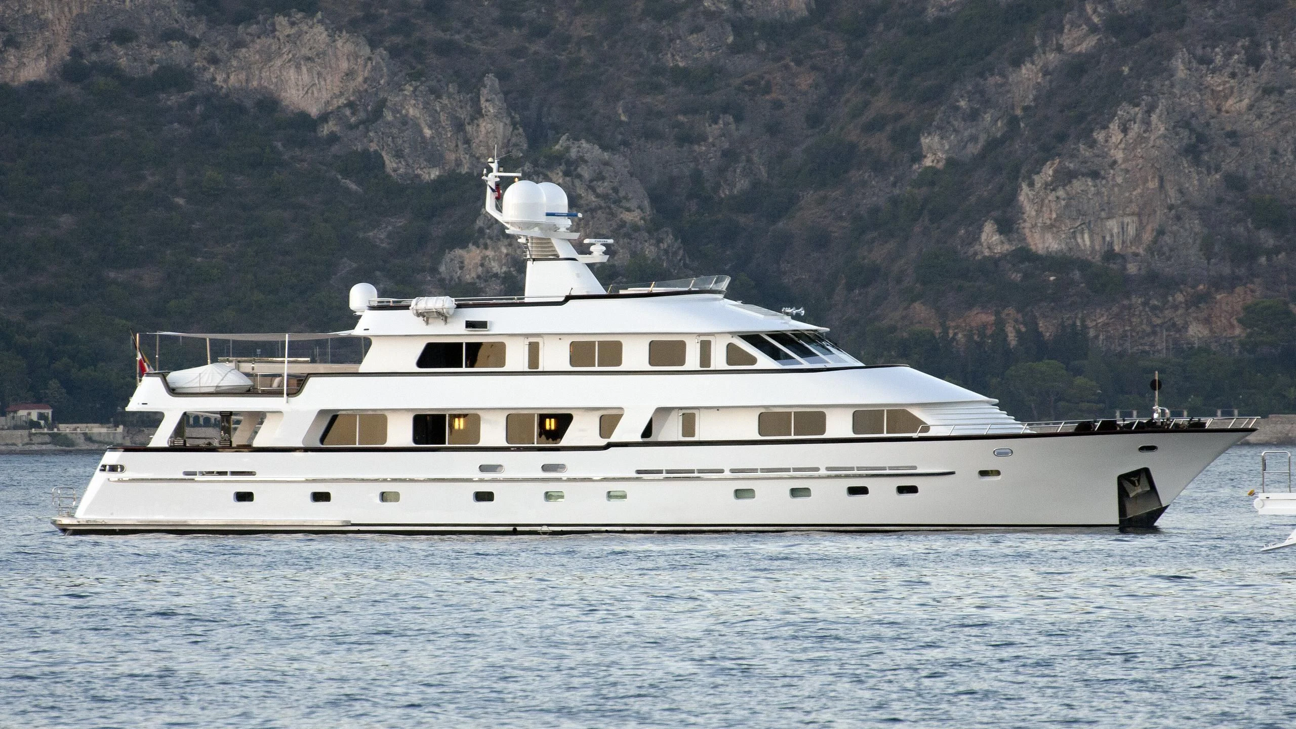 a white yacht in the water aboard LIGAYA Yacht for Sale