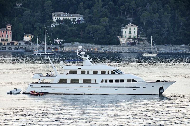 a white boat in the water aboard LIGAYA Yacht for Sale