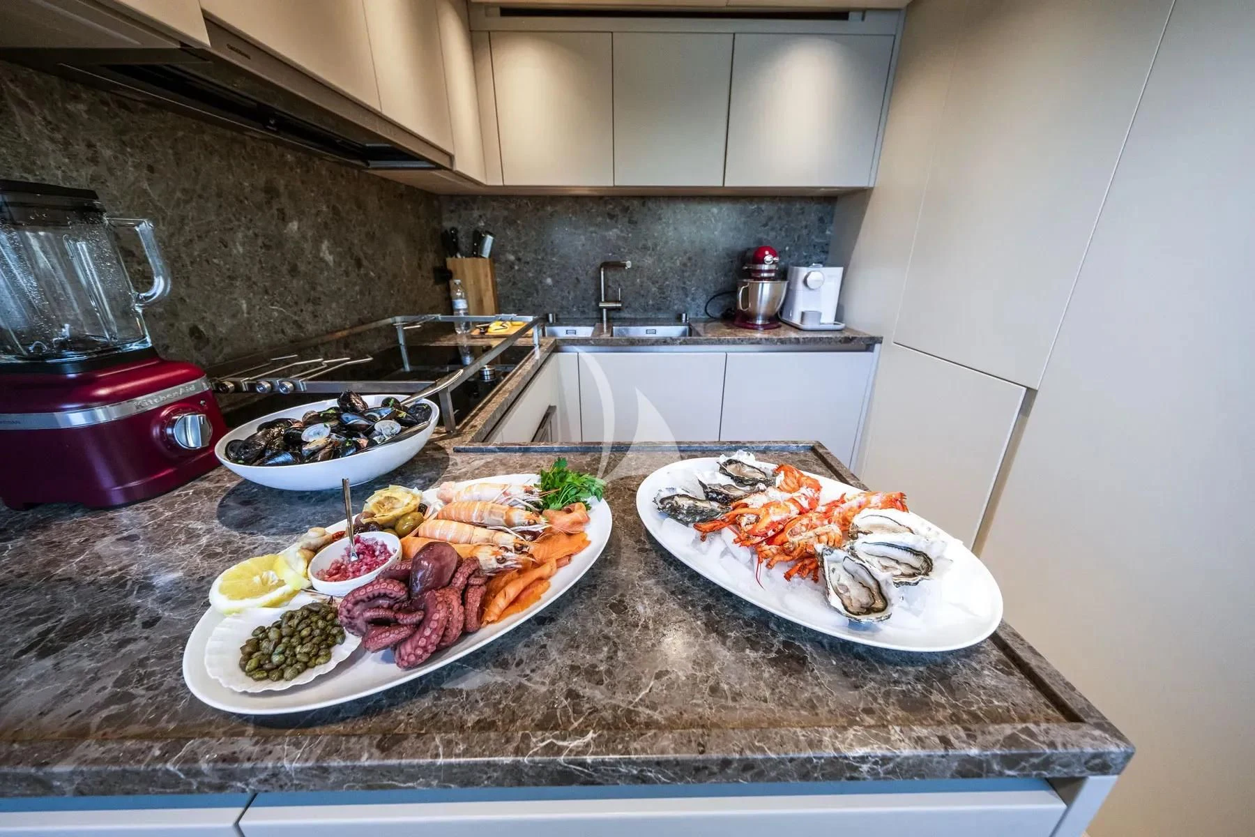 a kitchen counter with food on it aboard AKIRA Yacht for Sale