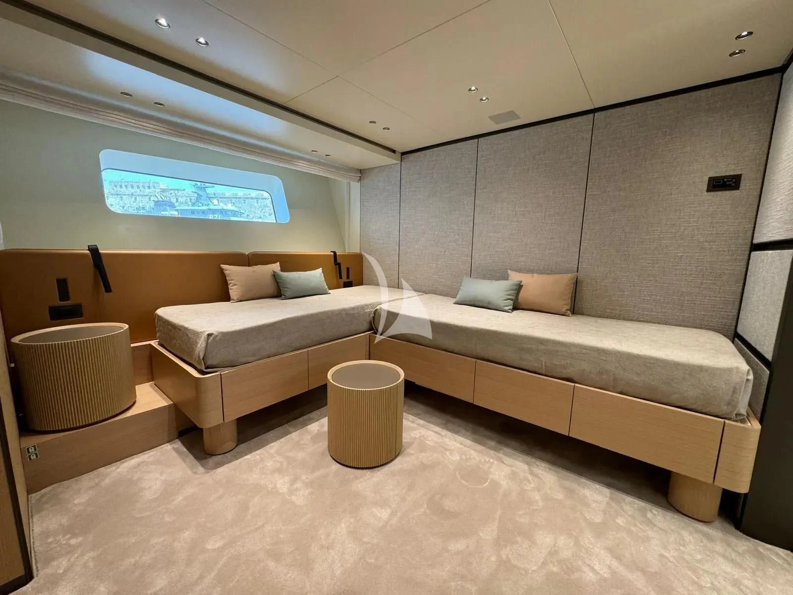 a room with a couch and a table aboard AKIRA Yacht for Sale