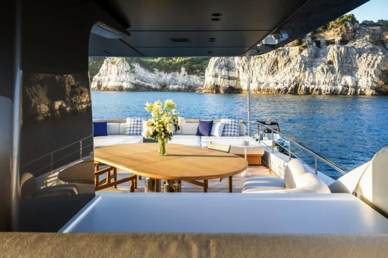 a table on a boat aboard AKIRA Yacht for Sale