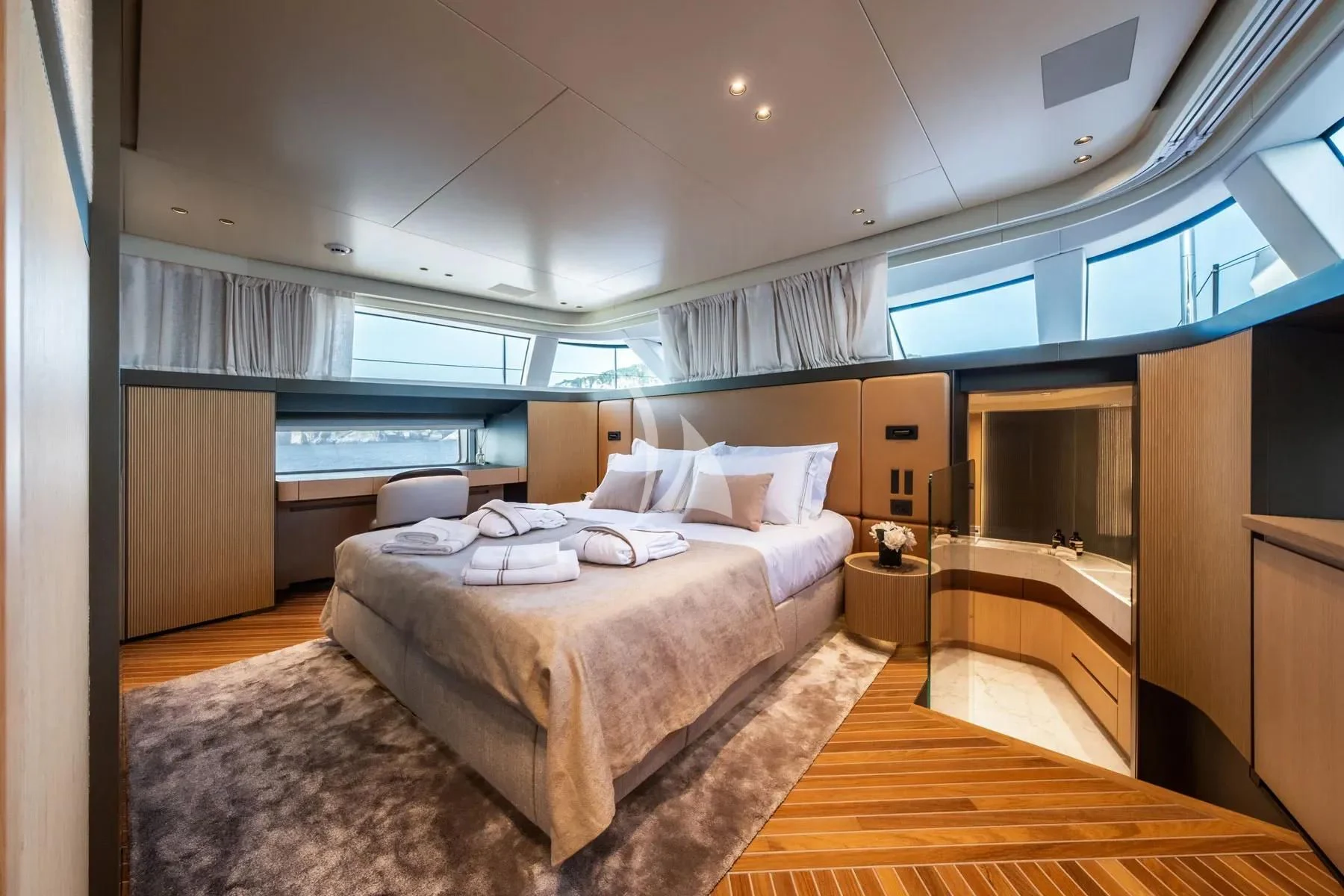 a room with a bed and a mirror aboard AKIRA Yacht for Sale