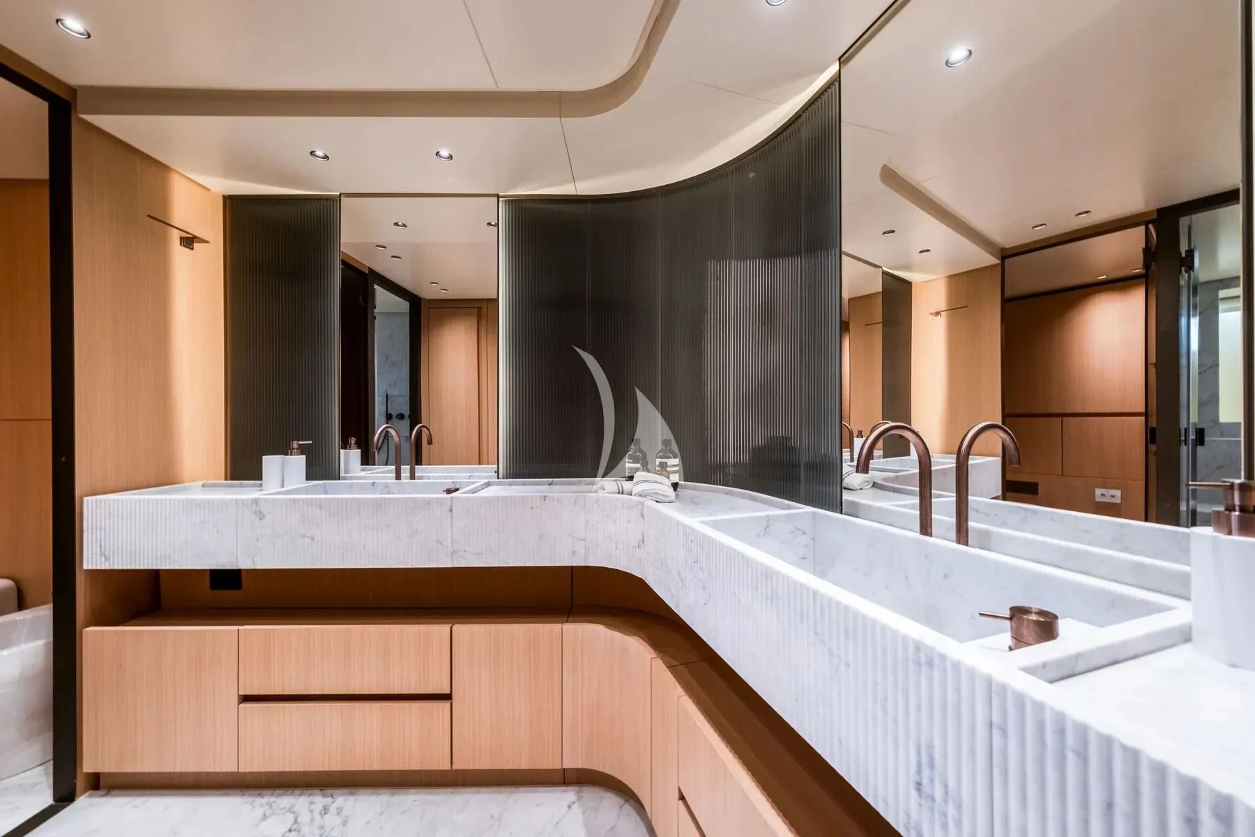 a bathroom with a large mirror aboard AKIRA Yacht for Sale