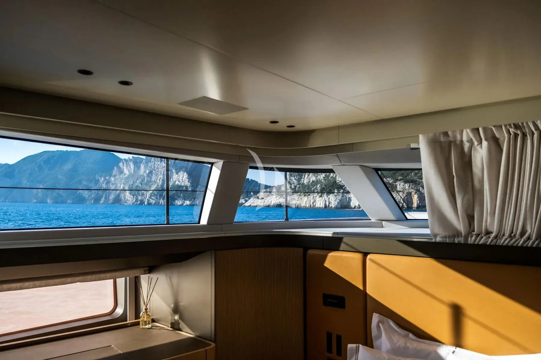 a room with a window and a curtain aboard AKIRA Yacht for Sale