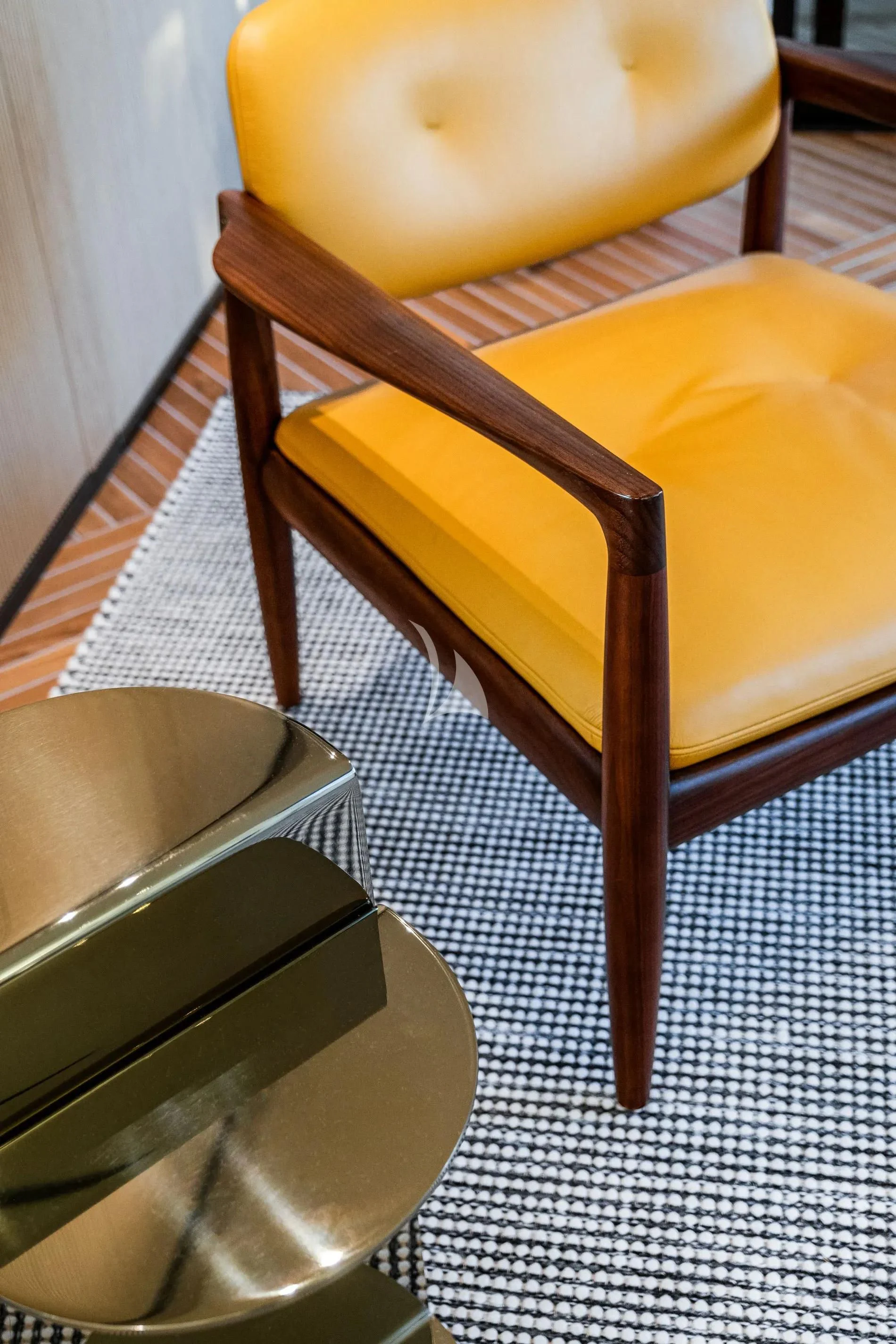 a chair with a stool aboard AKIRA Yacht for Sale
