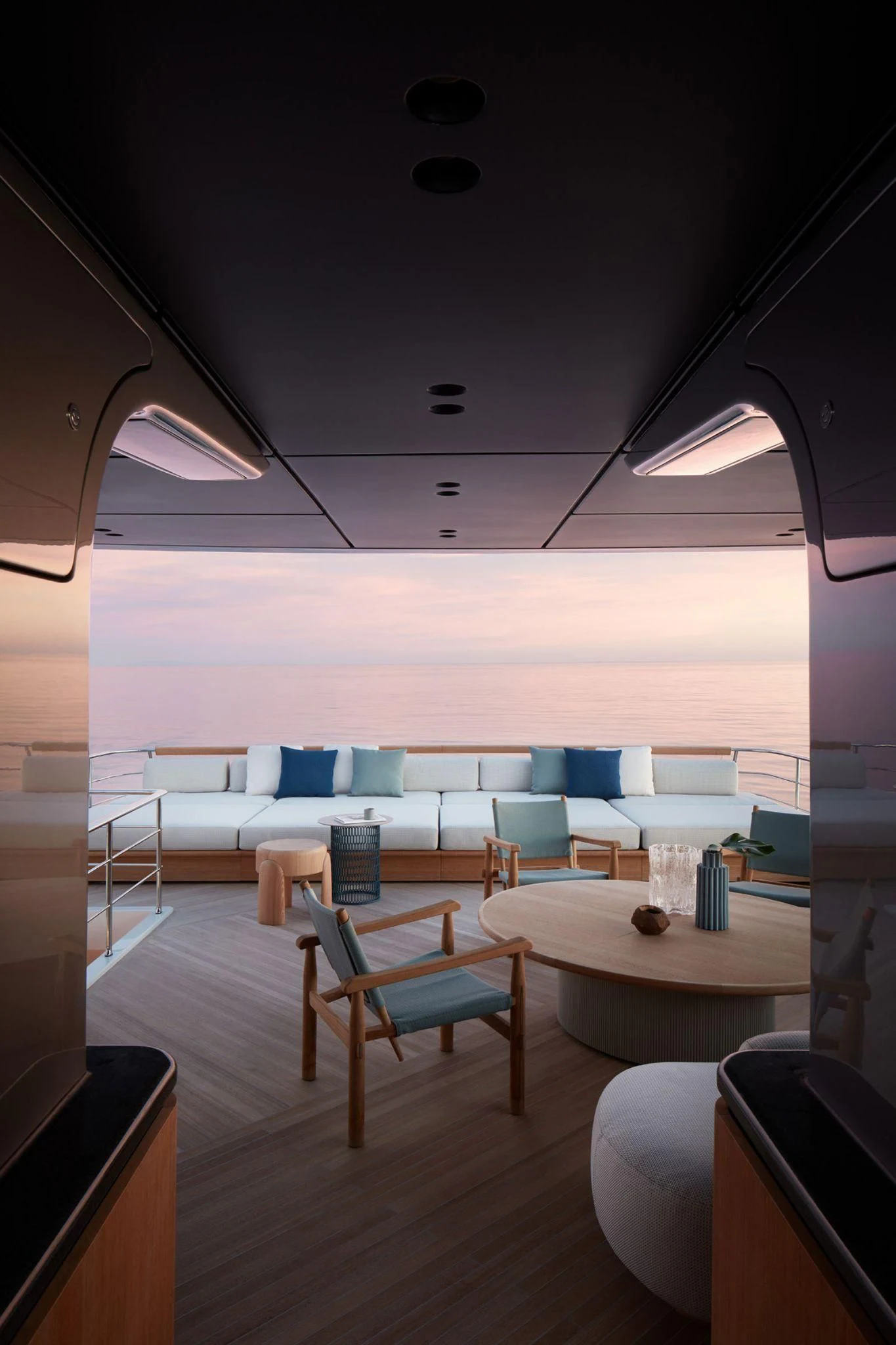 a room with a table and chairs aboard AKIRA Yacht for Sale