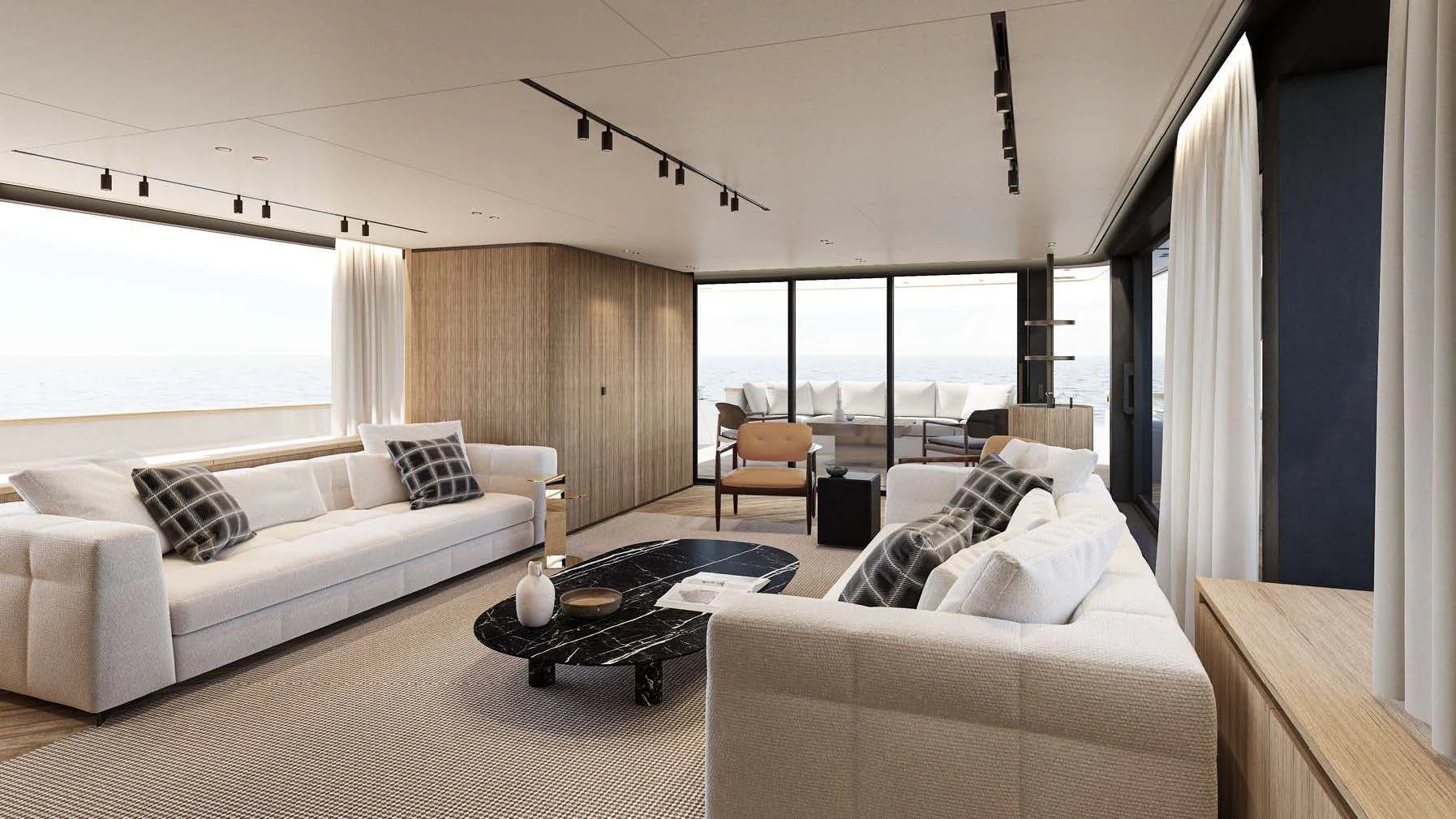 a living room with a couch and a coffee table aboard AKIRA Yacht for Sale