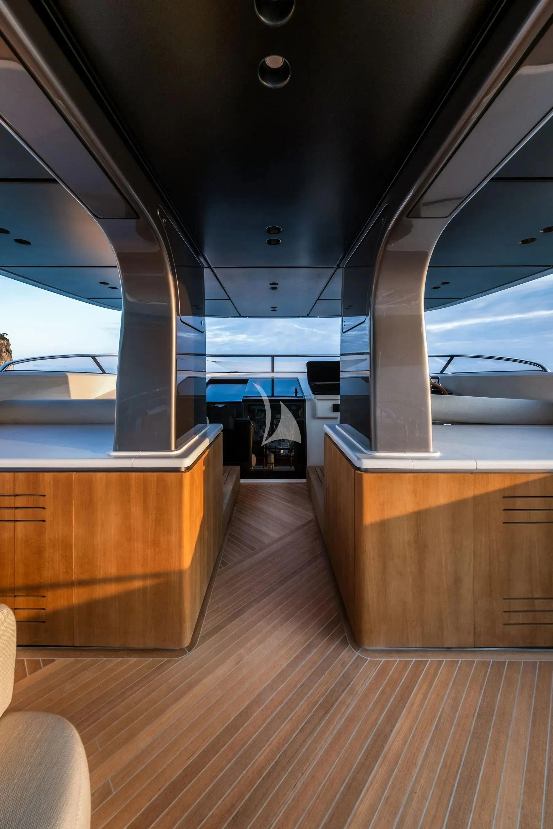 a room with wood floors and a wood floor and a large window aboard AKIRA Yacht for Sale