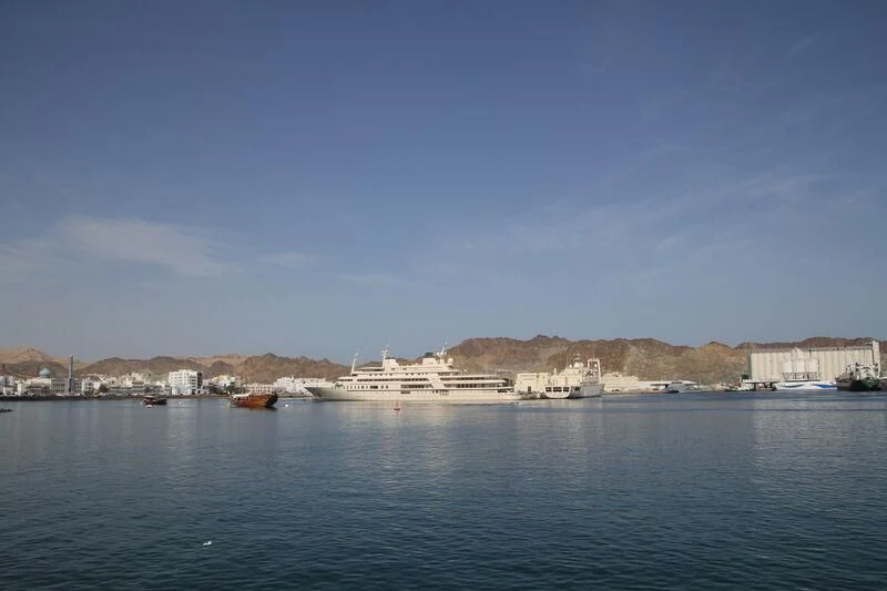 a body of water with buildings on the side aboard DHAFI Yacht for Sale