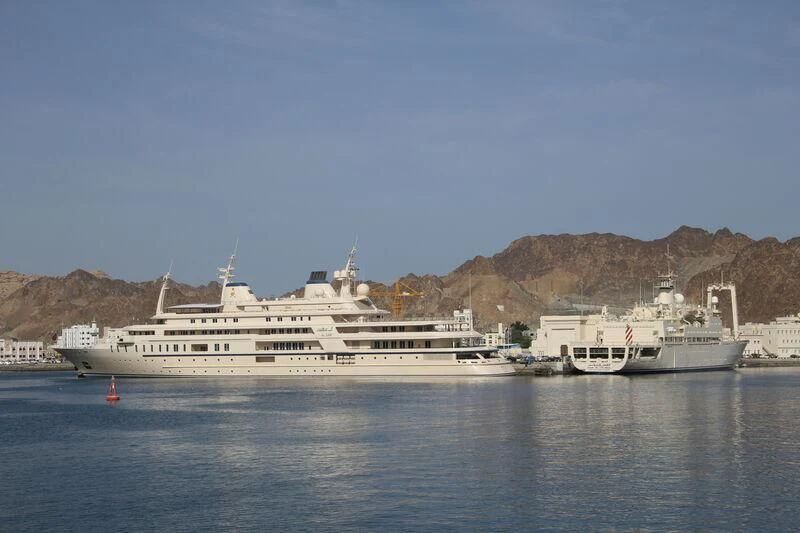 a large ship in the water aboard DHAFI Yacht for Sale