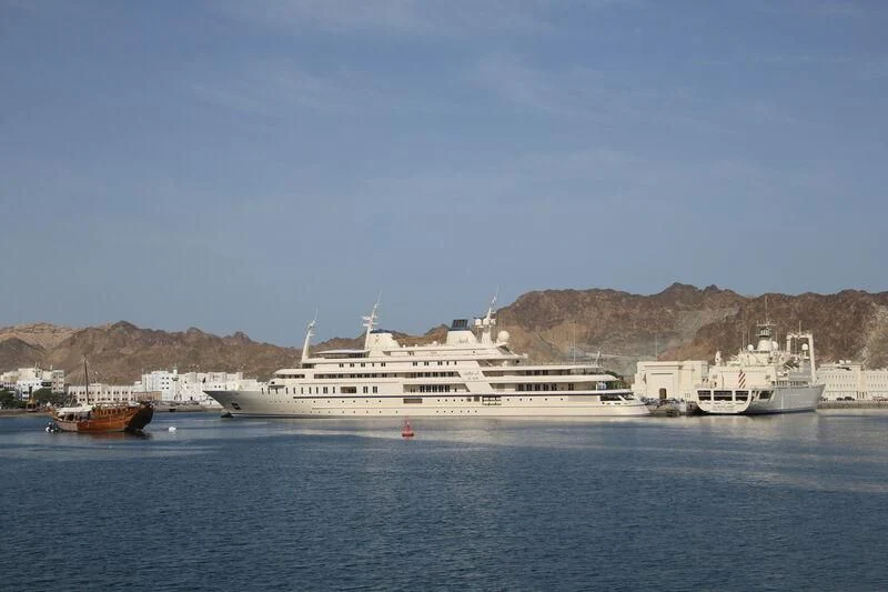 a large cruise ship in the water aboard DHAFI Yacht for Sale