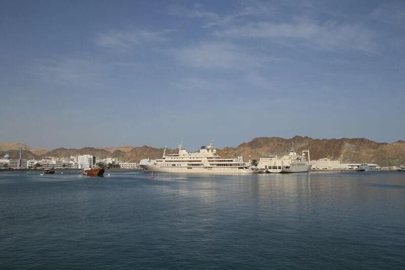 a body of water with boats and buildings on the side aboard DHAFI Yacht for Sale