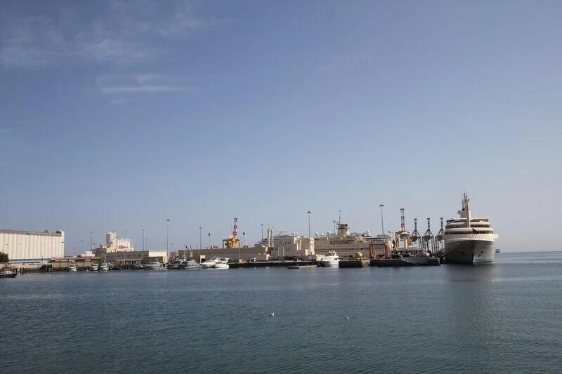 a group of boats in a harbor aboard DHAFI Yacht for Sale