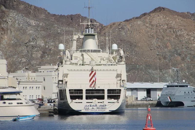 a large white boat in the water aboard DHAFI Yacht for Sale