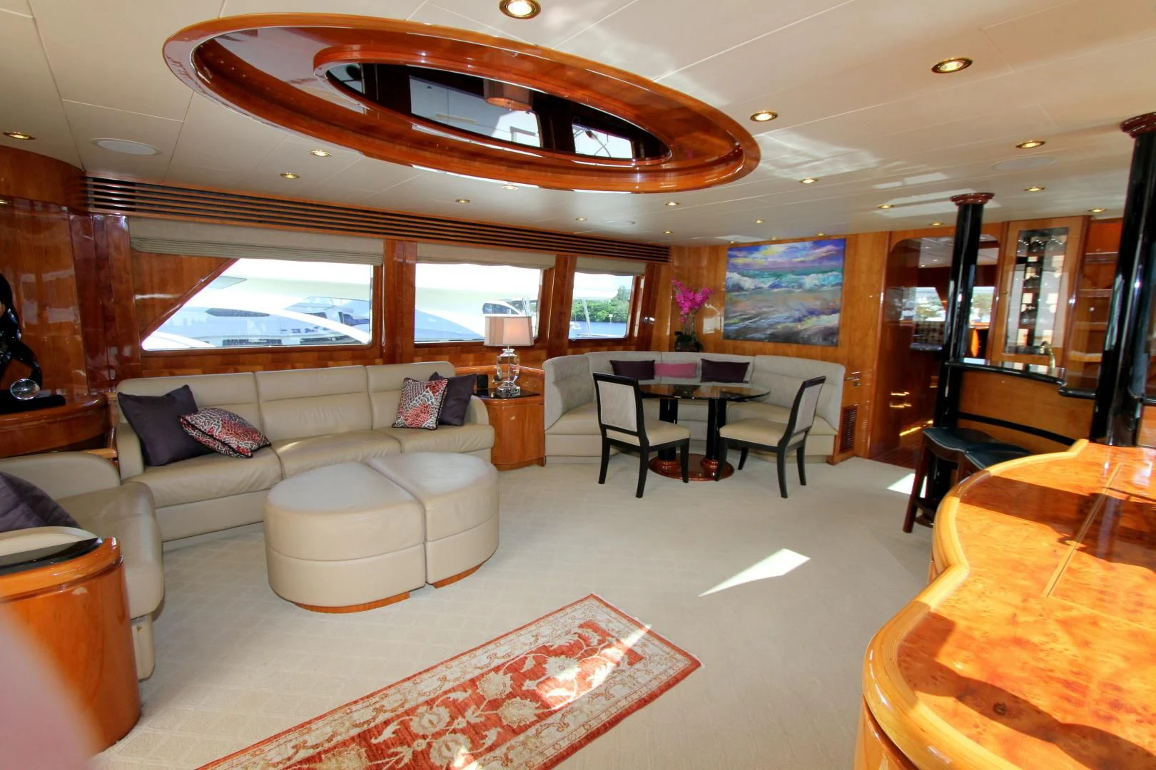a living room with a large window aboard KISMET Yacht for Sale