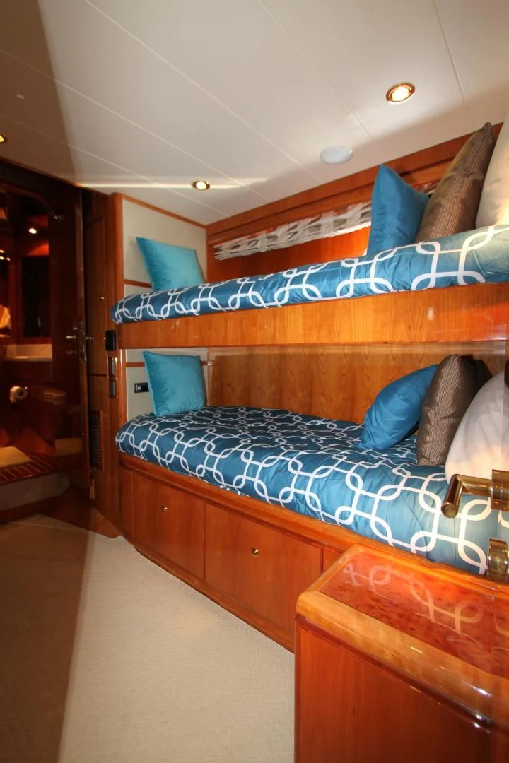 a bed in a room aboard KISMET Yacht for Sale