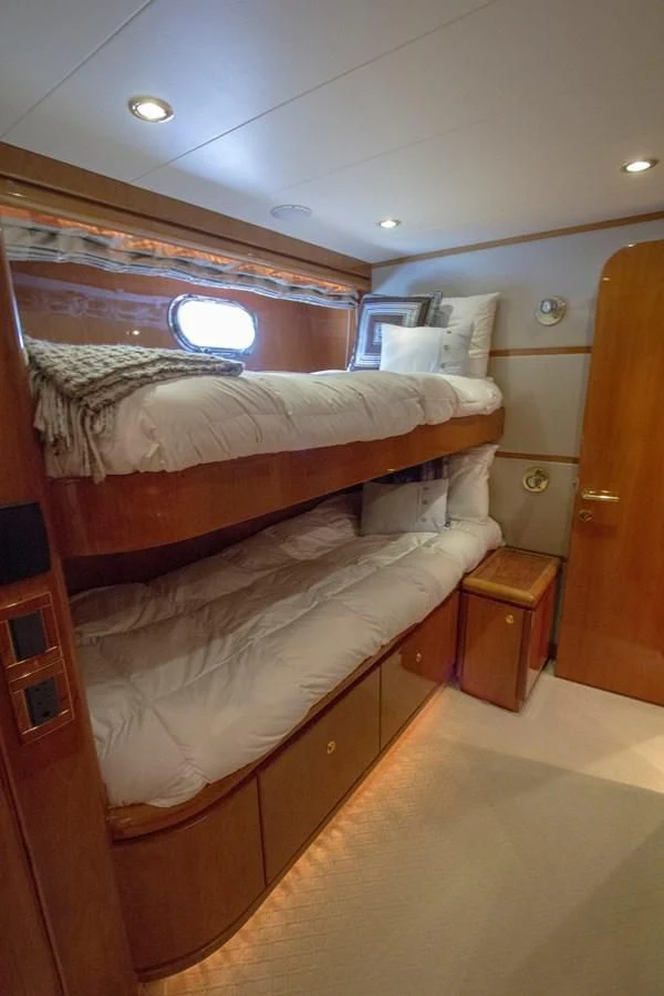 a room with two beds aboard KISMET Yacht for Sale