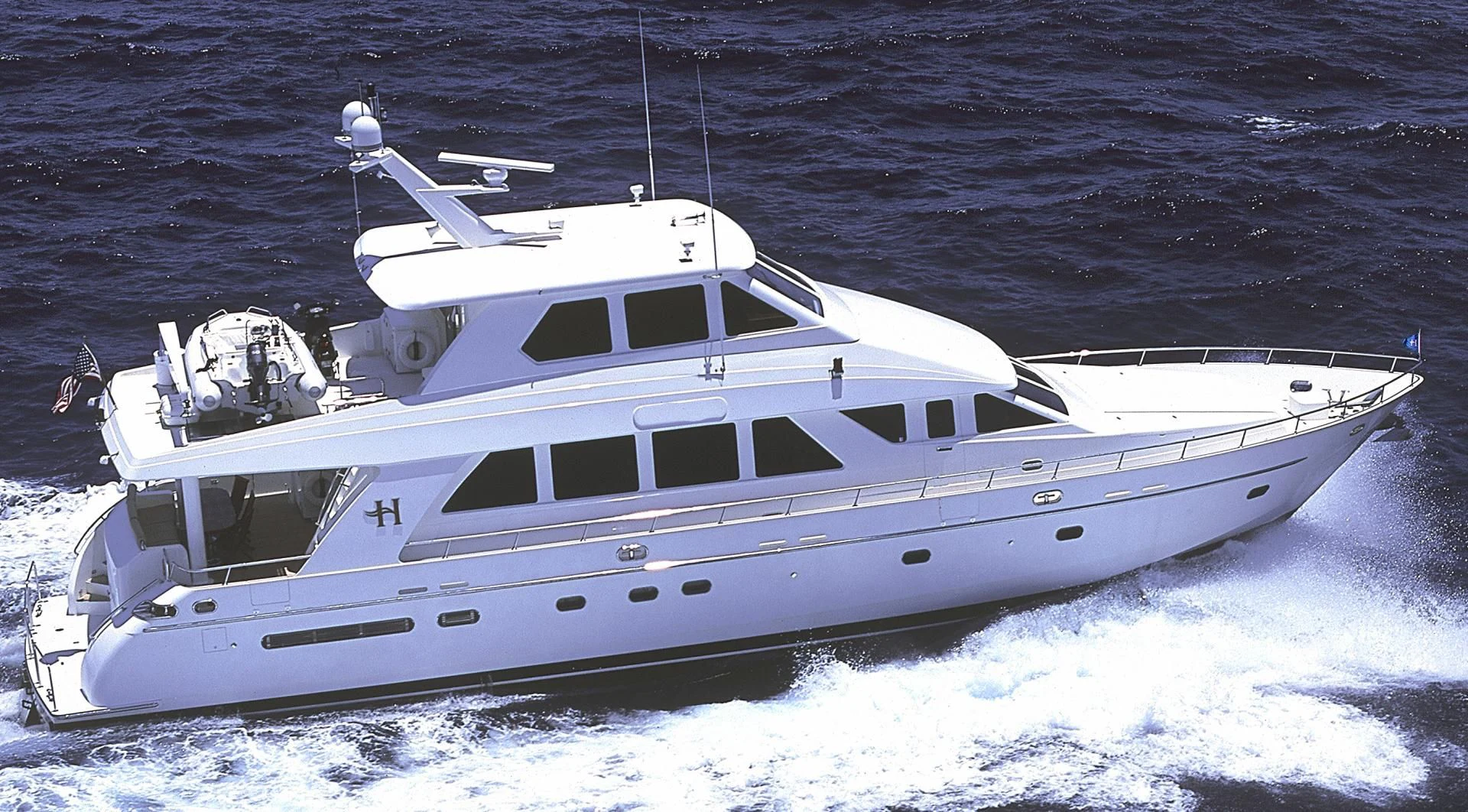 a white yacht on the water aboard KISMET Yacht for Sale