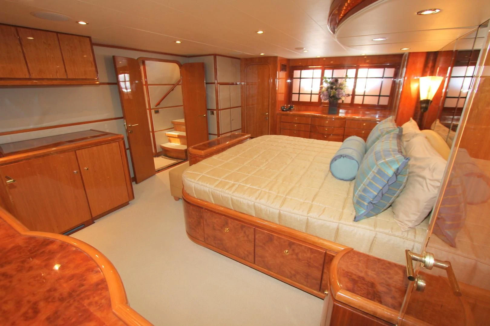 a large bed in a room aboard KISMET Yacht for Sale