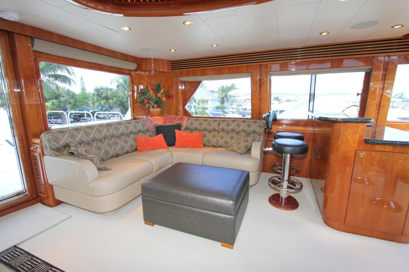 a living room with a couch and a coffee table aboard KISMET Yacht for Sale