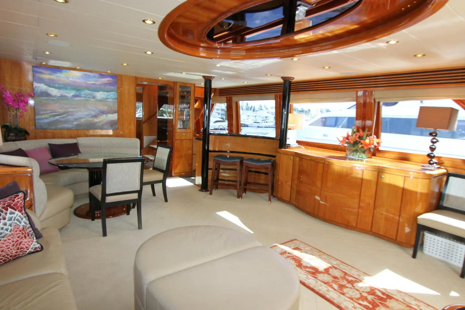 a room with a couch and a table and chairs aboard KISMET Yacht for Sale