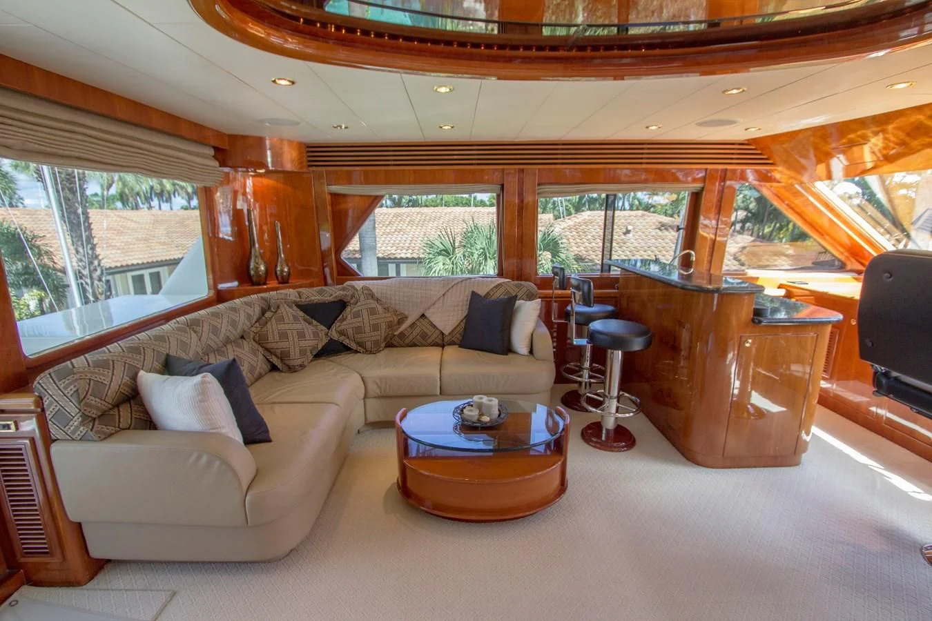 a living room with a couch and a coffee table aboard KISMET Yacht for Sale