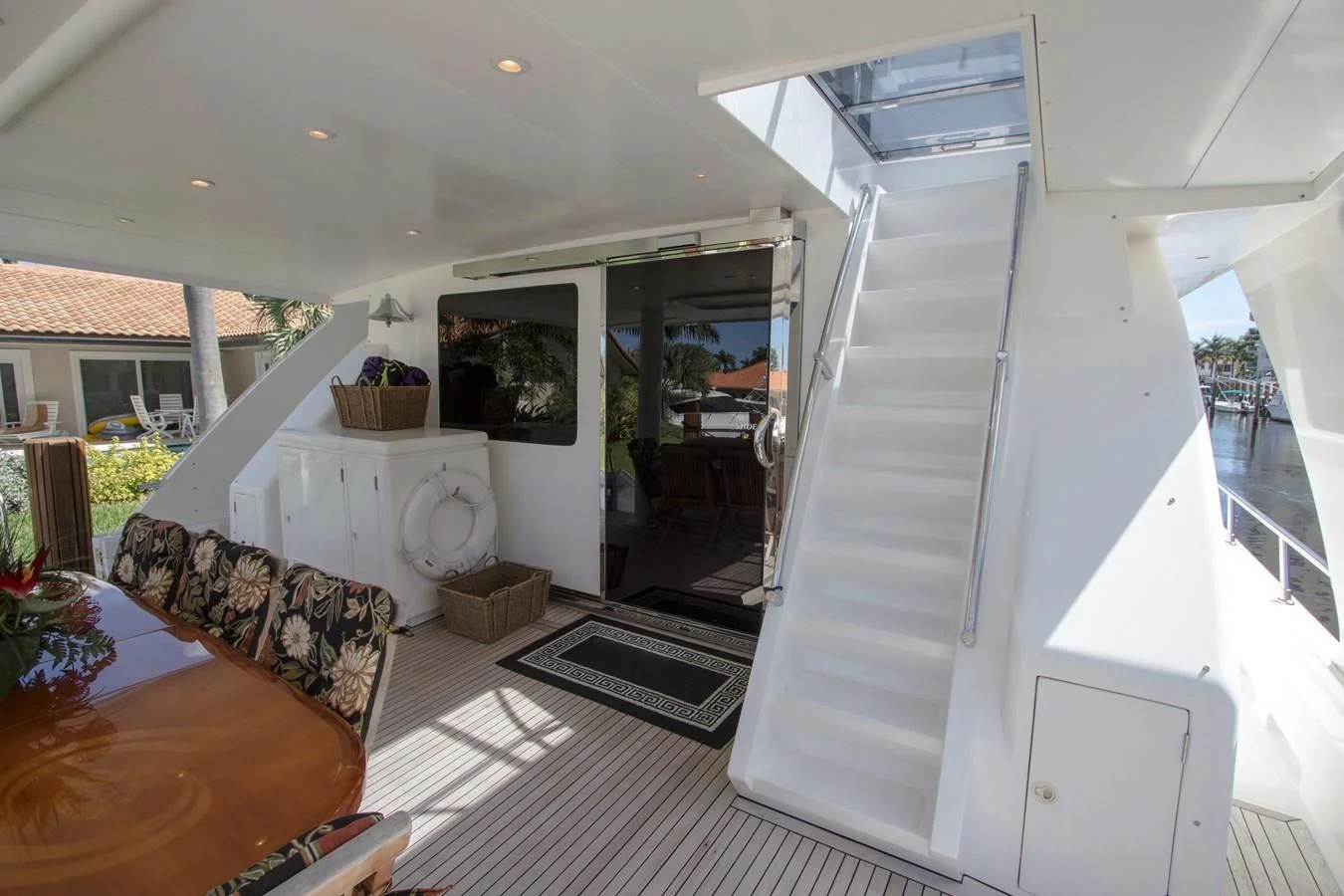 a white staircase in a house aboard KISMET Yacht for Sale