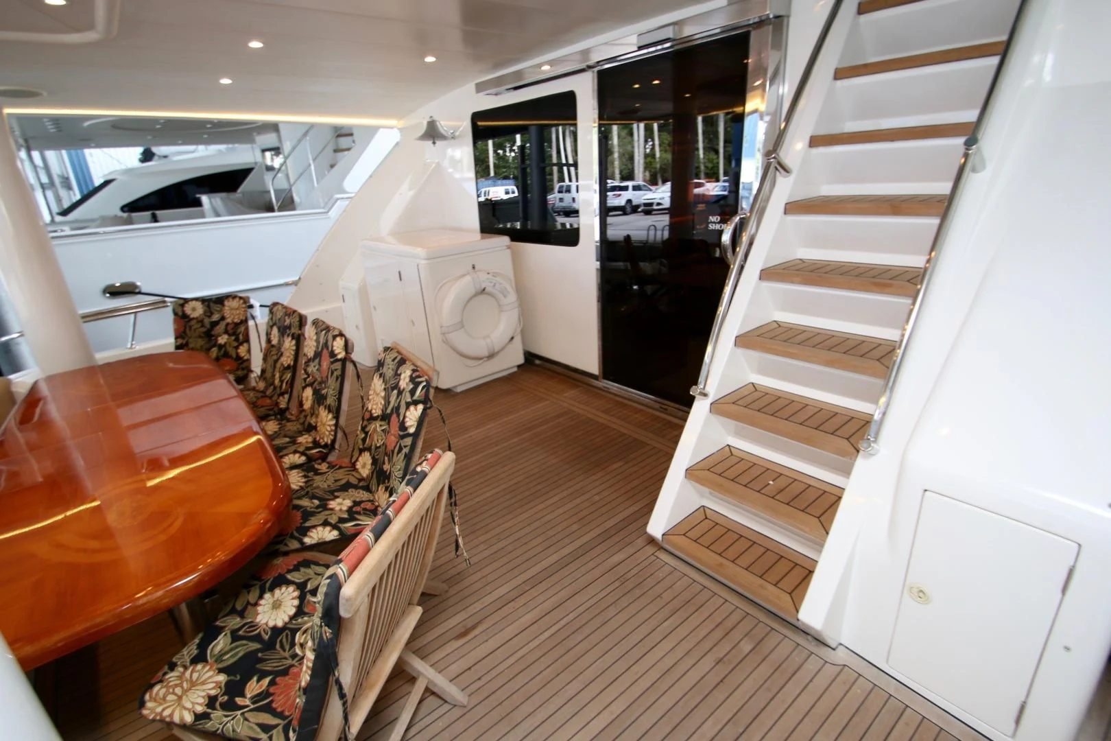 a room with a table and chairs aboard KISMET Yacht for Sale