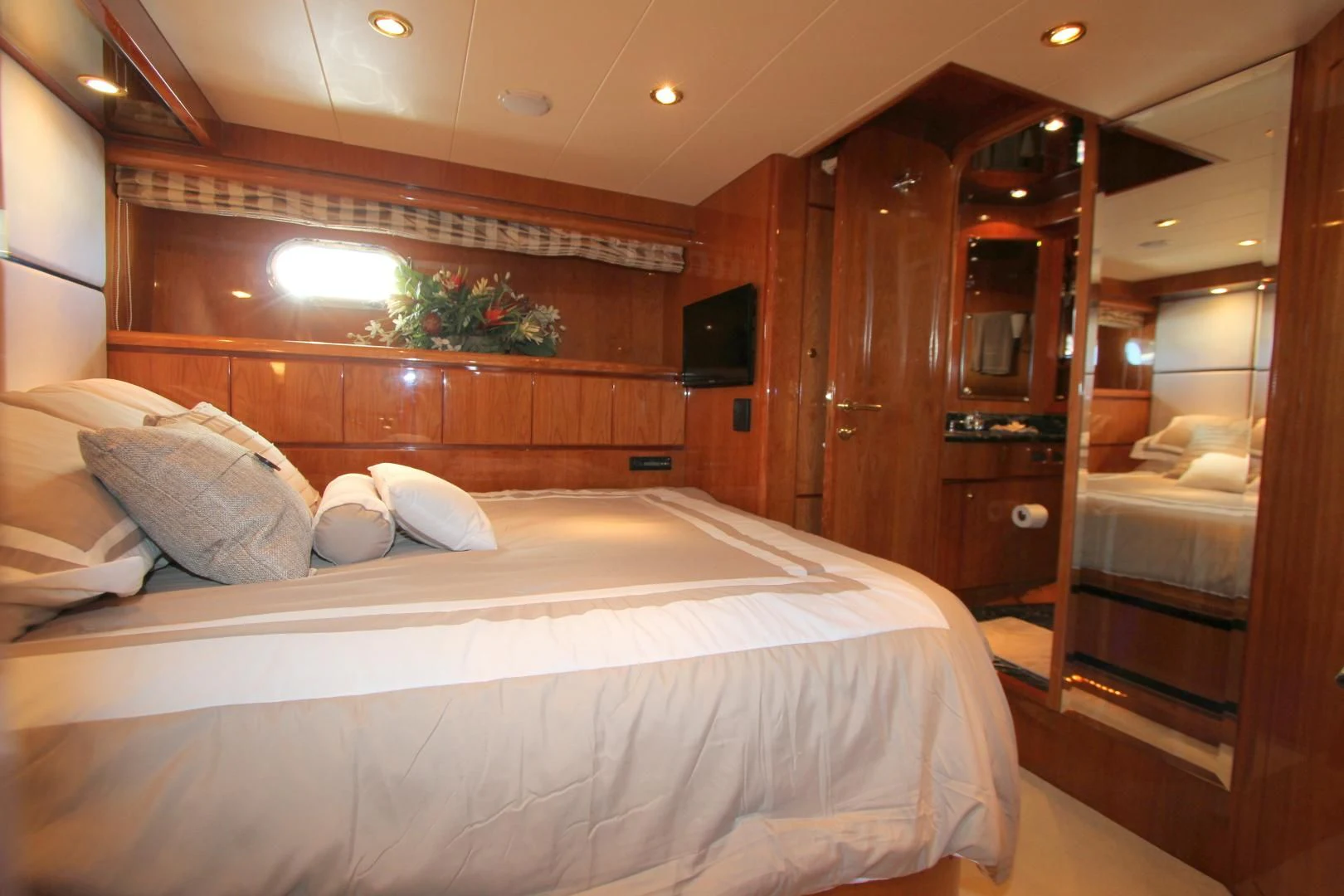 a bed in a room aboard KISMET Yacht for Sale