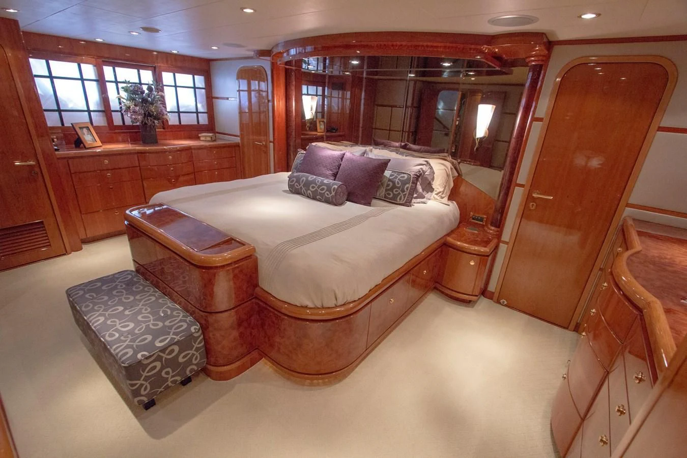 a large room with a couch and a coffee table aboard KISMET Yacht for Sale