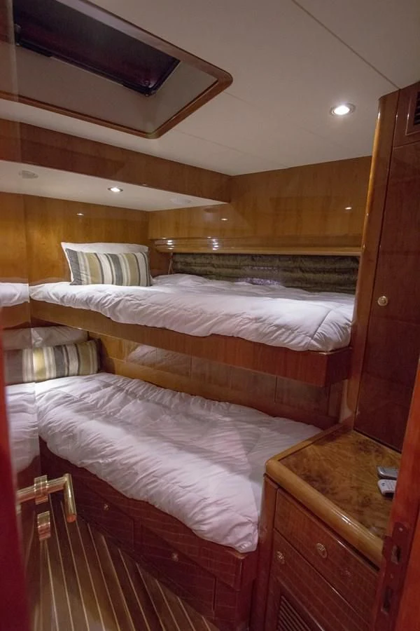 a room with wooden walls aboard KISMET Yacht for Sale