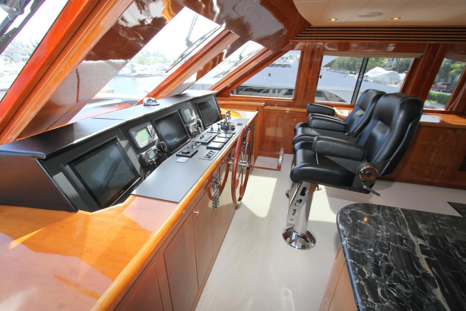 a room with a couch and a tv aboard KISMET Yacht for Sale