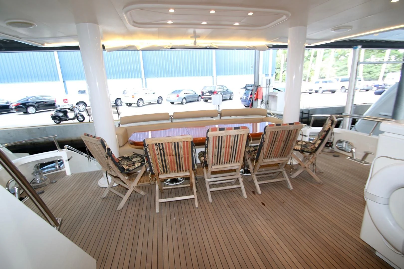 a room with a table and chairs aboard KISMET Yacht for Sale