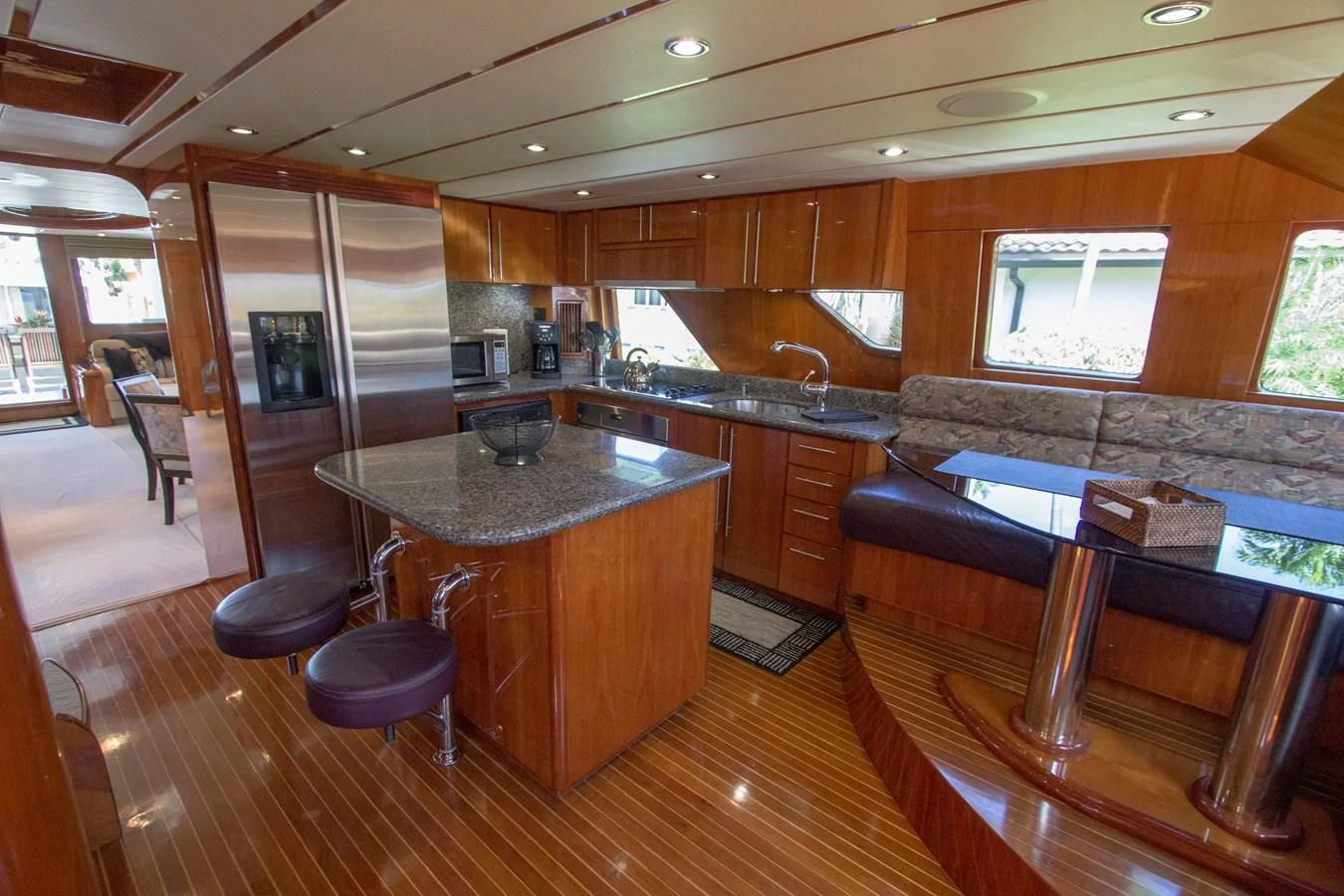 a kitchen with a bar and a bar aboard KISMET Yacht for Sale