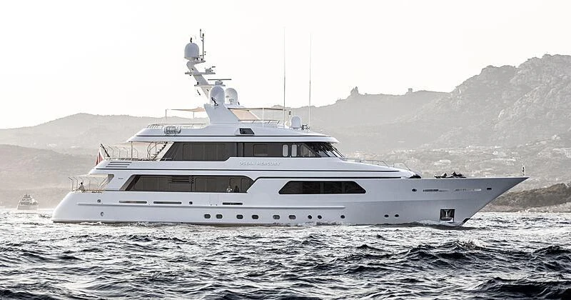 a large white ship in the water aboard OCEAN MERCURY Yacht for Sale