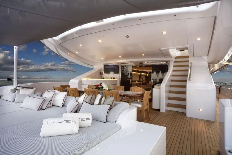 a room with a large bed and a large window aboard ELSEA Yacht for Sale