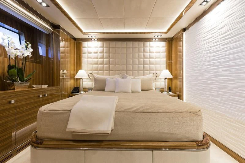 a large bedroom with a large bed aboard ELSEA Yacht for Sale