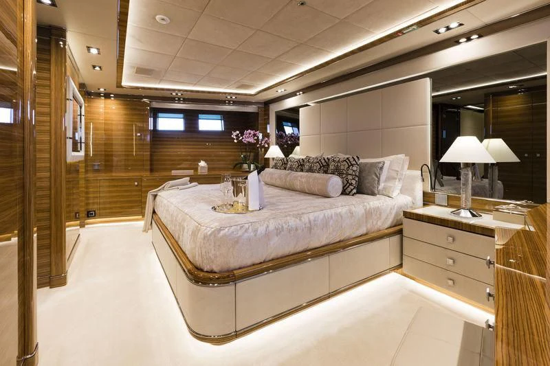 a large bedroom with a bed aboard ELSEA Yacht for Sale