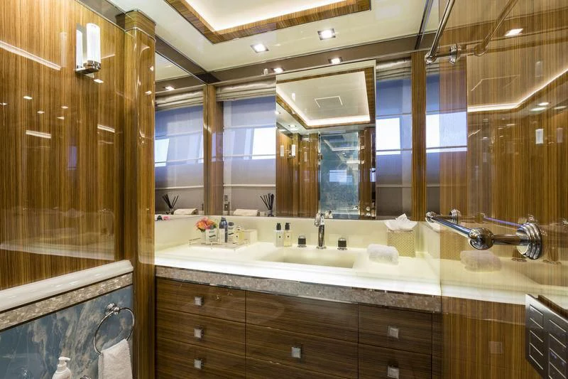 a bathroom with a large mirror aboard ELSEA Yacht for Sale