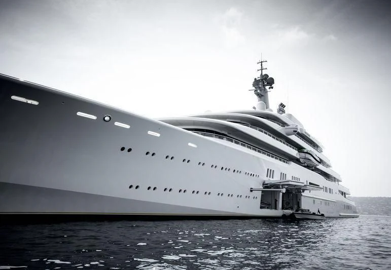 a large ship in the water aboard ECLIPSE Yacht for Sale