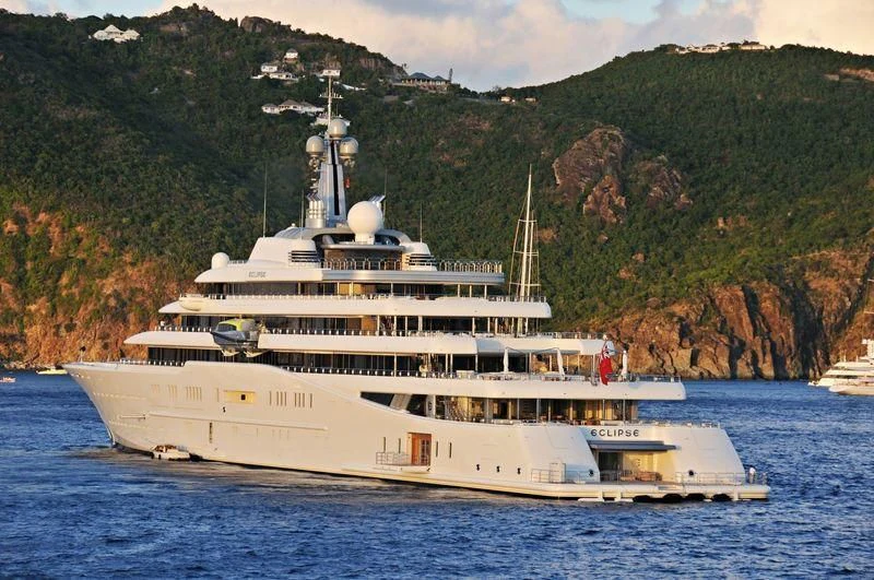 a large white boat in the water aboard ECLIPSE Yacht for Sale