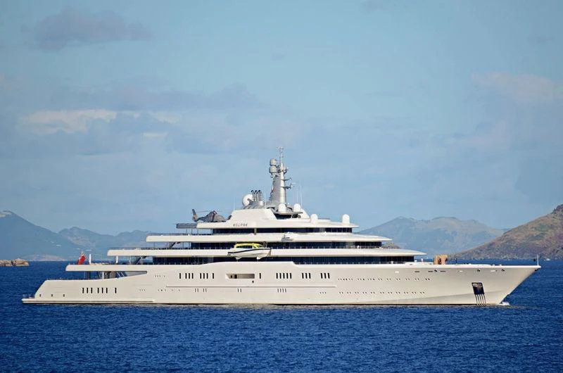 a large white ship in the water aboard ECLIPSE Yacht for Sale
