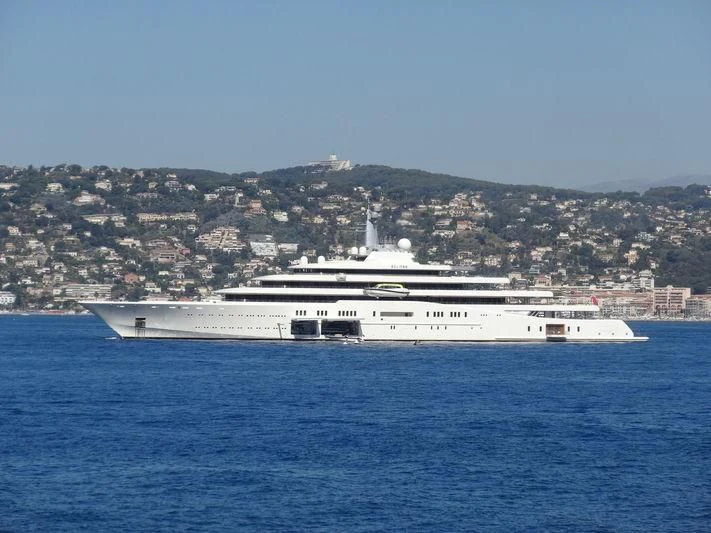 a large ship in the water aboard ECLIPSE Yacht for Sale