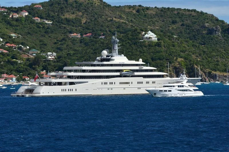 a large white ship in the water aboard ECLIPSE Yacht for Sale