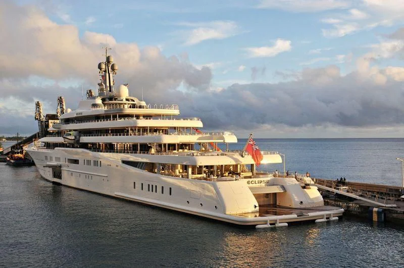 a large ship in the water aboard ECLIPSE Yacht for Sale