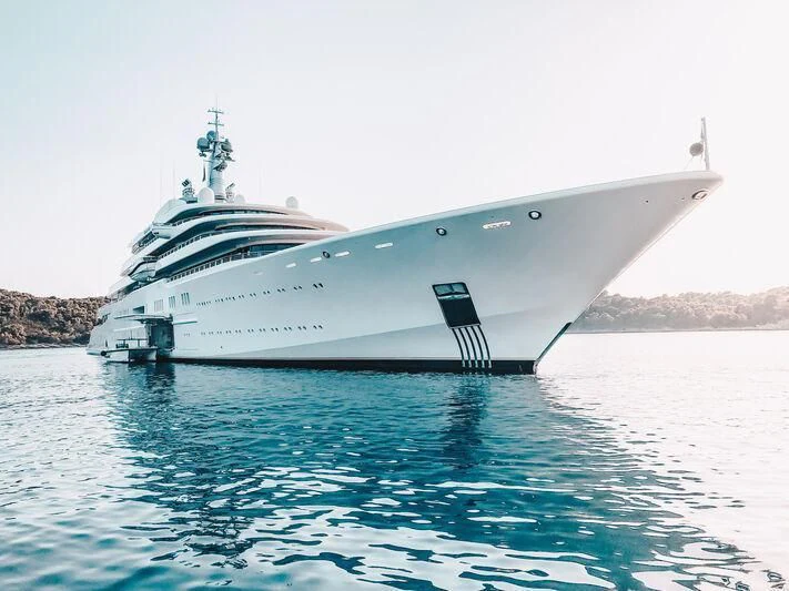 a large white ship on the water aboard ECLIPSE Yacht for Sale