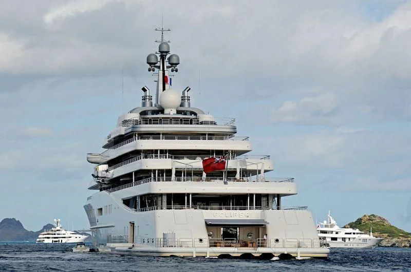 a cruise ship docked at a port aboard ECLIPSE Yacht for Sale